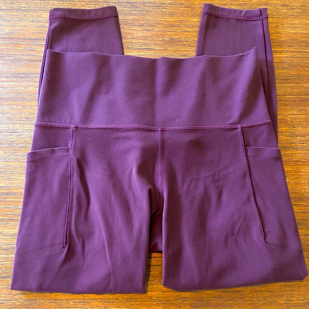 Athleta Salutation Stash Pocket II 7/8 Tight Spiced Cabernet